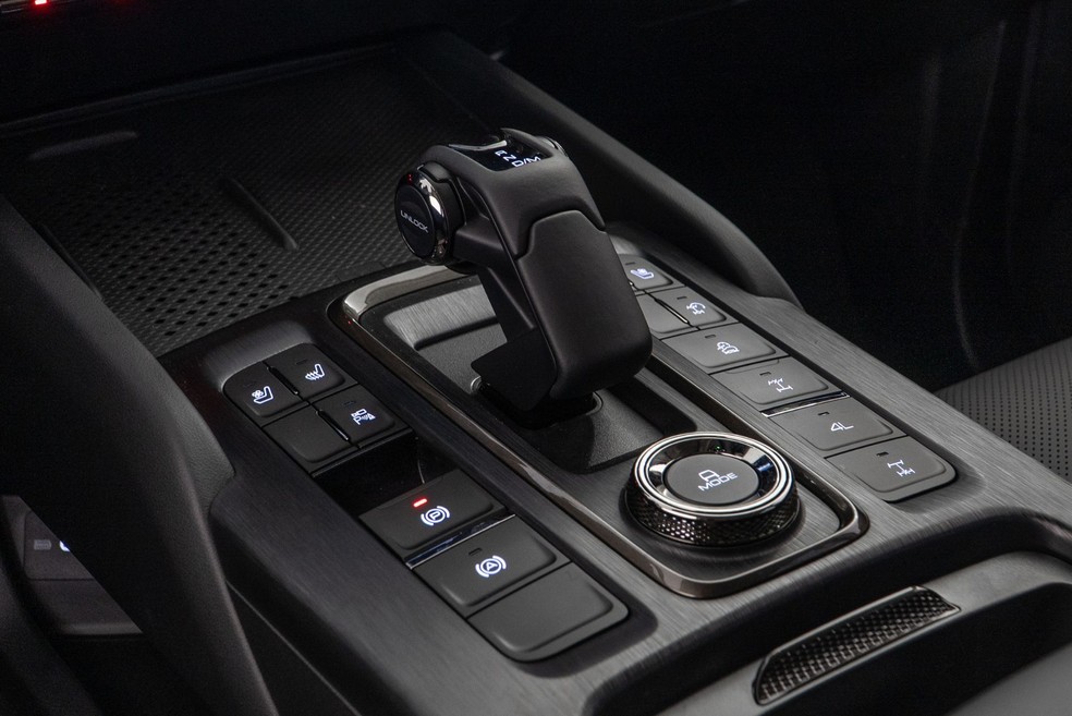 Console central traz atalhos para mudar modos de condução no GWM Haval H9  — Foto: Divulgação