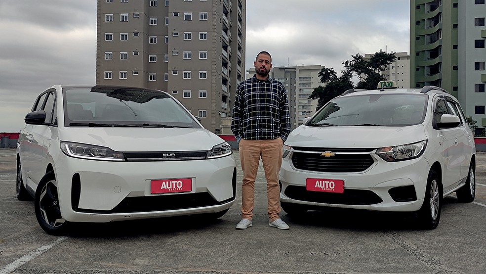 André Akira, taxista e dono de uma Chevrolet Spin aprovou o BYD D1 — Foto: Murilo Góes